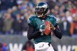 PHILADELPHIA, PA - JANUARY 09:  Michael Vick #7 of the Philadelphia Eagles drops back against the Green Bay Packers during the 2011 NFC wild card playoff game at Lincoln Financial Field on January 9, 2011 in Philadelphia, Pennsylvania.  (Photo by Chris Trotman/Getty Images)