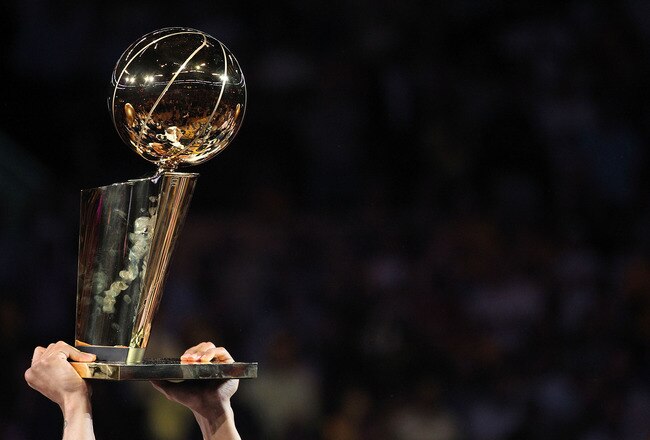 LOS ANGELES, CA - JUNE 17:  The Los Angeles Lakers hold up the Larry O'Brien Trophy after the Lakers defeated the Boston Celtics in Game Seven of the 2010 NBA Finals at Staples Center on June 17, 2010 in Los Angeles, California.  NOTE TO USER: User expressly acknowledges and agrees that, by downloading and/or using this Photograph, user is consenting to the terms and conditions of the Getty Images License Agreement.  (Photo by Ronald Martinez/Getty Images)