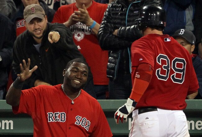 BOSTON, MA - MAY 20:  David Ortiz #34 of the Boston Red Sox congratulates Jarrod Saltalamacchia #39 after he hit a solo home run against the Chicago Cubs on May 20, 2011 at Fenway Park in Boston, Massachusetts.on May 20, 2011 at Fenway Park in Boston, Massachusetts. The Chicago Cubs and the Boston Red Sox have not played at Fenway Park since the 1918 World Series.  (Photo by Elsa/Getty Images)