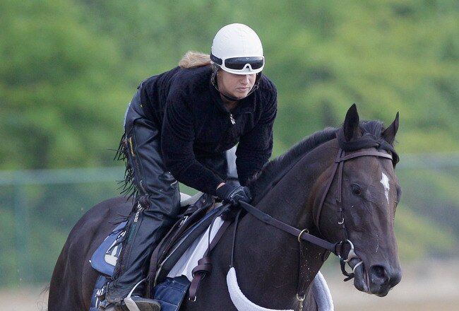 BALTIMORE, MD - MAY 20: Exercise rider Stacy Prior takes Preakness entrant Dialed In over the track at Pimlico Race Course on May 20, 2011 in Baltimore, Maryland. The 136th running of the Preakness Stakes will take place on May 21.   (Photo by Rob Carr/Getty Images)