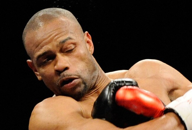LAS VEGAS - APRIL 03:  Roy Jones Jr. (L) and Bernard Hopkins trade blows during the second round of their light heavyweight bout at the Mandalay Bay Events Center April 3, 2010 in Las Vegas, Nevada. Hopkins won by unanimous decision.  (Photo by Ethan Miller/Getty Images)