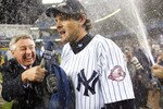 BRONX, NY - OCTOBER 16:  Aaron Boone #19 of the New York Yankees is showered with champagne after defeating the Boston Red Sox 6-5 in game 7 of the American League Championship Series on October 16, 2003 at Yankee Stadium in the Bronx, New York.  The Yankees won the game 6-5 on a game winning home run by Aaron Boone, advancing them to the World Series.  (Photo by Al Bello/Getty Images)