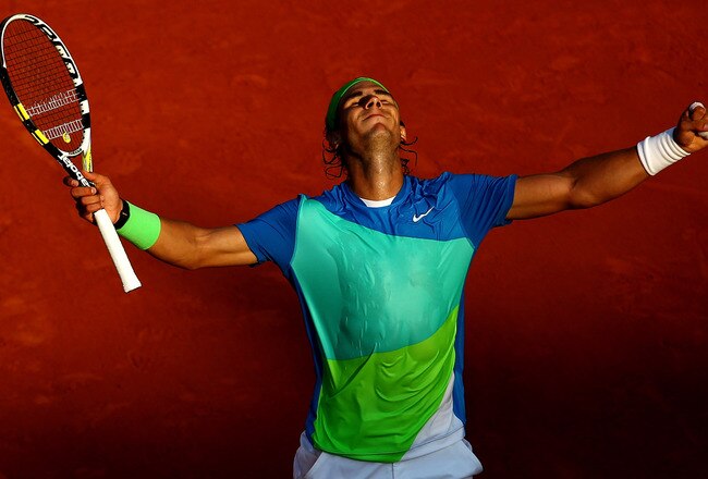 PARIS - JUNE 04:  Rafael Nadal of Spain celebrates at match point during the men's singles semi final match between Rafael Nadal of Spain and Jurgen Melzer of Austria at the French Open on day thirteen of the French Open at Roland Garros on June 4, 2010 in Paris, France.  (Photo by Julian Finney/Getty Images)