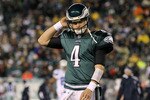 PHILADELPHIA, PA - JANUARY 02:  Kevin Kolb #4 of the Philadelphia Eagles looks on against the Dallas Cowboys on January 2, 2011 at Lincoln Financial Field in Philadelphia, Pennsylvania.  (Photo by Jim McIsaac/Getty Images)