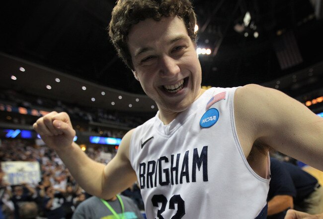 DENVER, CO - MARCH 19:  Jimmer Fredette #32 of the Brigham Young Cougars walks off of the court after defeating the Gonzaga Bulldogs during the third round of the 2011 NCAA men's basketball tournament at Pepsi Center on March 19, 2011 in Denver, Colorado.  (Photo by Doug Pensinger/Getty Images)