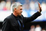 LONDON, ENGLAND - MAY 15:  Carlo Ancelotti the Chelsea manager acknowledges the home fans following the Barclays Premier League match between Chelsea and Newcastle United at Stamford Bridge on May 15, 2011 in London, England.  (Photo by Michael Regan/Getty Images)
