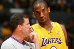 LOS ANGELES, CA - APRIL 28:  Kobe Bryant #8 of the Los Angeles Lakers talks to referee Tim Donaghy #21, in the first half against the Phoenix Suns in Game Three of the Western Conference Quarterfinals during the 2006 NBA Playoffs April 28, 2006 at Staples Center in Los Angeles, California.  (Photo by Lisa Blumenfeld/Getty Images)