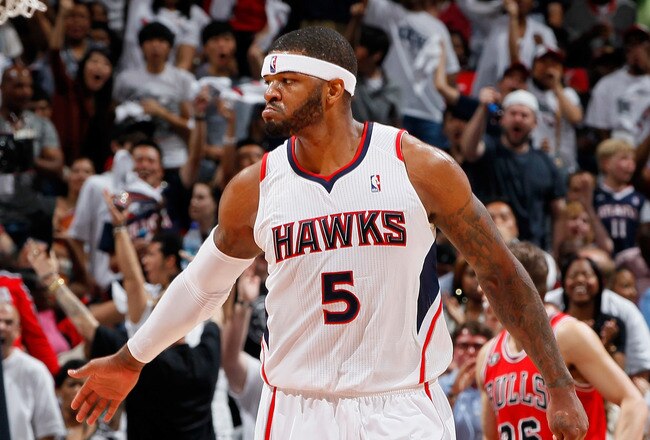 ATLANTA, GA - MAY 08:  Josh Smith #5 of the Atlanta Hawks reacts after a basket against the Chicago Bulls in Game Four of the Eastern Conference Semifinals in the 2011 NBA Playoffs at Phillips Arena on May 8, 2011 in Atlanta, Georgia.  NOTE TO USER: User expressly acknowledges and agrees that, by downloading and/or using this photograph, User is consenting to the terms and conditions of the Getty Images License Agreement.  (Photo by Kevin C. Cox/Getty Images)