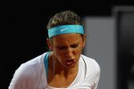 ROME, ITALY - MAY 13:  Victoria Azarenka of Belarus  celebrates a point during her quarter final match against Maria Sharapova of Russia during day six of the Internazoinali BNL D'Italia at the Foro Italico Tennis Centre  on May 13, 2011 in Rome, Italy.  (Photo by Clive Brunskill/Getty Images)