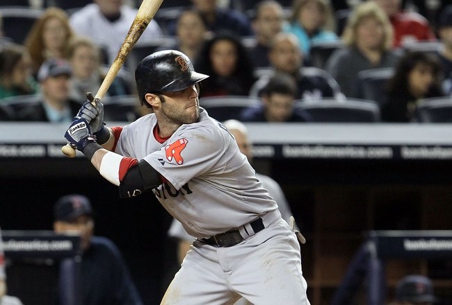 NEW YORK, NY - MAY 14:  Dustin Pedroia #15 of the Boston Red Sox bats against the New York Yankees on May 14, 2011 at Yankee Stadium in the Bronx borough of New York City.  (Photo by Jim McIsaac/Getty Images)