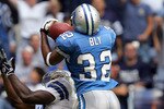 IRVING, TX - OCTOBER 31:  Cornerback Dre Bly #32 of the Detroit Lions makes a pass interception intended for wide receiver Keyshawn Johnson #19 of the Dallas Cowboys on October 31, 2004 at Texas Stadium in Irving, Texas.  (Photo by Ronald Martinez/Getty Images)