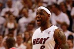 MIAMI, FL - MAY 22:  LeBron James #6 of the Miami Heat reacts against the Chicago Bulls in Game Three of the Eastern Conference Finals during the 2011 NBA Playoffs on May 22, 2011 at American Airlines Arena in Miami, Florida.  NOTE TO USER: User expressly acknowledges and agrees that, by downloading and or using this photograph, User is consenting to the terms and conditions of the Getty Images License Agreement.  (Photo by Marc Serota/Getty Images)
