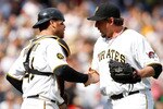 PITTSBURGH - MAY 08:  Joel Hanrahan #52 of the Pittsburgh Pirates celebrates with teammate Ryan Doumit #41 after their win against the Houston Astros during the game on May 8, 2011 at PNC Park in Pittsburgh, Pennsylvania.  (Photo by Jared Wickerham/Getty Images)