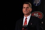 SAN FRANCISCO, CA - JANUARY 07:  Jim Harbaugh speaks at a press conference where he was introduced as the new San Francisco 49ers head coach at the Palace Hotel on January 7, 2011 in San Francisco, California.  (Photo by Ezra Shaw/Getty Images)