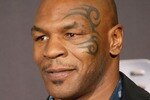 LOS ANGELES- OCTOBER 26:  Mike Tyson attends the BET 25th Anniversary Show at the Shrine Auditorium on October 26, 2005 in Los Angeles, California.  (Photo by Frederick M. Brown/Getty Images).