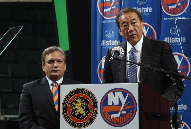 UNIONDALE, NY - MAY 11: (L-R) Nassau County Executive Edward Mangano and New York Islanders owner Charles Wang announce a referendum that will build a new arena and keep the Islanders in place through 2045 during a press conference at the Nassau Veterans Memorial Coliseum on May 11, 2011 in Uniondale, New York.  (Photo by Bruce Bennett/Getty Images)