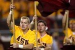 TEMPE, AZ - SEPTEMBER 15:  Arizona State Sun Devils cheerleaders run through the end zone with banners after a touchdown against the San Diego State Aztecs on September 15, 2007 at Sun Devil Stadium in Tempe, Arizona.  Arizona State won 34-13. (Photo by Stephen Dunn/Getty Images)