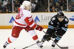 SAN JOSE, CA - MAY 08:  Kyle Wellwood #20 of the San Jose Sharks tries to stop Brian Rafalski #28 of the Detroit Red Wings in Game Five of the Western Conference Semifinals during the 2011 NHL Stanley Cup Playoffs at HP Pavilion on May 8, 2011 in San Jose, California.  (Photo by Ezra Shaw/Getty Images)