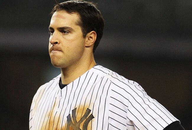 NEW YORK, NY - MAY 15:  Mark Teixeira #25 of the New York Yankees reacts having been left on base  during his game against the Boston Red Sox on May 15, 2011 at Yankee Stadium in the Bronx borough of New York City.  (Photo by Al Bello/Getty Images)