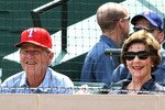 ARLINGTON, TX - APRIL 24:   Former U.S. President George W. Bush and wife, Laura Bush attend a game between the Kansas City Royals and the Texas Rangers at Rangers Ballpark in Arlington on April 24, 2011 in Arlington, Texas.  (Photo by Ronald Martinez/Getty Images)