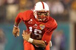 ORLANDO, FL - DECEMBER 28:  Russell Wilson #16 of the North Carolina State Wolfpack rushes with the ball during the Champs Sports Bowl against the West Virginia Mountineers at Florida Citrus Bowl Stadium on December 28, 2010 in Orlando, Florida.  (Photo by Mike Ehrmann/Getty Images)
