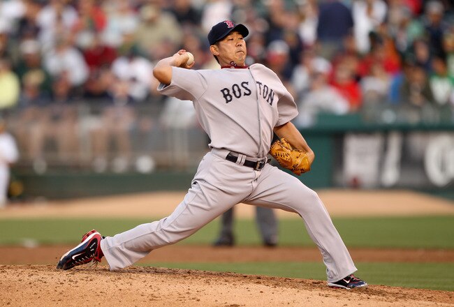 OAKLAND, CA - JULY 19:  Daisuke Matsuzaka #18 of the Boston Red Sox pitches against the Oakland Athletics at the Oakland-Alameda County Coliseum  on July 19, 2010 in Oakland, California.  (Photo by Ezra Shaw/Getty Images)