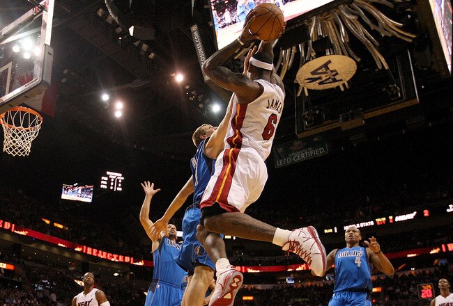 MIAMI, FL - DECEMBER 20:  LeBron James #6 of the Miami Heat passes over Dirk Nowitzki #41 of the Dallas Mavericks  during a game at American Airlines Arena on December 20, 2010 in Miami, Florida. NOTE TO USER: User expressly acknowledges and agrees that, by downloading and/or using this Photograph, User is consenting to the terms and conditions of the Getty Images License Agreement.  (Photo by Mike Ehrmann/Getty Images)