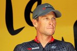 RODEZ, FRANCE - JULY 17:  Lance Armstrong of the USA and Team Radioshack signs on at the start of stage thirteen of the 2010 Tour de France from Rodez to Revel on July 17, 2010 in Revel, France.  (Photo by Bryn Lennon/Getty Images)