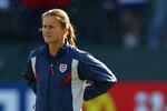PORTLAND, OR - OCTOBER 5:  Brandi Chastain #6 and coach April Heinrichs of the USA look on prior to the semifinals match against Germany in the FIFA Women's World Cup  match on October 5, 2003 at PGE Park in Portland, Oregon.  Germany defeated the U.S. 3-0. (Photo by Ben Radford/Getty Images)