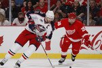 DETROIT - APRIL 18: Rick Nash #61 of the Columbus Blue Jackets tries to get around Brian Rafalski #28 of the Detroit Red Wings during Game Two of the Western Conference Quarterfinals of the 2009 NHL Stanley Cup Playoffs on April 18, 2009 at Joe Louis Arena in Detroit, Michigan.  (Photo by Gregory Shamus/Getty Images)