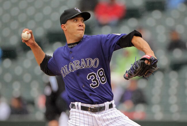 DENVER, CO - MAY 12:  Starting pitcher Ubaldo Jimenez #38 of the Colorado Rockies delivers against the New York Mets at Coors Field on May 12, 2011 in Denver, Colorado.  (Photo by Doug Pensinger/Getty Images)