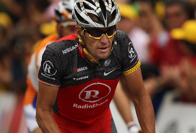 REVEL, FRANCE - JULY 17: Lance Armstrong of team RadioShack crosses the finish line of the 196km Stage 13 of the Tour de France on July 17, 2010 in Revel, France. Armstrong is currently in 36th place, over 25 minutes back.The hilly stage from Rodez featured a final climb, the category three 1.9-kilometres Saint-Ferreol. While Luxembourg's Andy Schleck of team Saxo Bank continues to wear the yellow jersey, Astana rider Alexandre Vinokourov won the stage.The iconic bicycle race will include a total of 20 stages and will cover 3,642km before concluding in Paris on July 25.  (Photo by Spencer Platt/Getty Images)