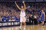 DALLAS, TX - MAY 25:  Dirk Nowitzki #41 of the Dallas Mavericks reacts after making a three-pointer in the fourth quarter while taking on the Oklahoma City Thunder in Game Five of the Western Conference Finals during the 2011 NBA Playoffs at American Airlines Center on May 25, 2011 in Dallas, Texas. NOTE TO USER: User expressly acknowledges and agrees that, by downloading and or using this photograph, User is consenting to the terms and conditions of the Getty Images License Agreement.  (Photo by Ronald Martinez/Getty Images)