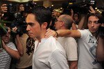 PINTO, SPAIN - SEPTEMBER 30:  Alberto Contador is surrounded by media at the end of his press conference where he pleaded his innocence after being tested positive for clenbuterol, a fat-burning and muscle-building drug, during this year's Tour de France, on September 30, 2010 in Pinto, Spain.  (Photo by Jasper Juinen/Getty Images)
