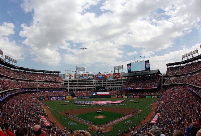 ARLINGTON, TX - APRIL 01:  A B-52 Bomber flies over the Rangers Ballpark in Arlington during the National Anthem during Opening Day on April 1, 2011 in Arlington, Texas.  (Photo by Tom Pennington/Getty Images)