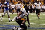 NEW ORLEANS - DECEMBER 20:  DeAndre Brown #5 of the Southern Miss Golden Eagles celebrates after catching a two point conversion pass against the Middle Tennessee Blue Raiders during the R+L Carriers New Orleans Bowl at the Louisiana Superdome on December 20, 2009 in New Orleans, Louisiana.  (Photo by Chris Graythen/Getty Images)