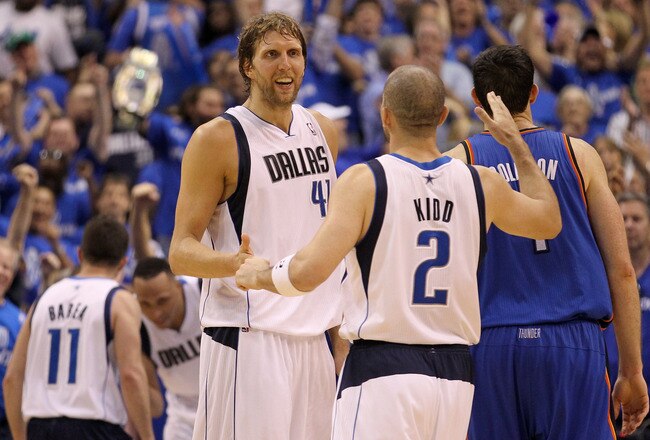 DALLAS, TX - MAY 25:  Dirk Nowitzki #41 and Jason Kidd #2 of the Dallas Mavericks celebrate late in the fourth quarter while taking on the Oklahoma City Thunder in Game Five of the Western Conference Finals during the 2011 NBA Playoffs at American Airlines Center on May 25, 2011 in Dallas, Texas. NOTE TO USER: User expressly acknowledges and agrees that, by downloading and or using this photograph, User is consenting to the terms and conditions of the Getty Images License Agreement.  (Photo by Ronald Martinez/Getty Images)