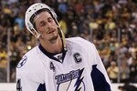 BOSTON, MA - MAY 27:  Vincent Lecavalier #4 of the Tampa Bay Lightning reacts after their 1 to 0 loss to the Boston Bruins in Game Seven of the Eastern Conference Finals during the 2011 NHL Stanley Cup Playoffs at TD Garden on May 27, 2011 in Boston, Massachusetts.  (Photo by Elsa/Getty Images)