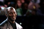 LAS VEGAS - FEBRUARY 17:  NBA legend Michael Jordan smiles as he is introduced as a judge for the Sprite Slam Dunk Competition during NBA All-Star Weekend on February 17, 2007 at Thomas & Mack Center in Las Vegas, Nevada.  NOTE TO USER: User expressly acknowledges and agrees that, by downloading and or using this photograph, user is consenting to the term and conditions of the Getty Images License Agreement.  (Photo by Lisa Blumenfeld/Getty Images)