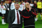 LONDON, ENGLAND - MAY 28:  Sir Alex Ferguson manager of Manchester United (L) and Mike Phelan assistant manager of Manchester United show their dejection after the UEFA Champions League final between FC Barcelona and Manchester United FC at Wembley Stadium on May 28, 2011 in London, England.  (Photo by Laurence Griffiths/Getty Images)