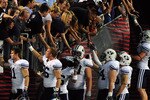 SAN DIEGO - OCTOBER 17: BYU Cougars celebrates with fans after the game against San Diego State Aztecs at Qualcomm Stadium on October 17, 2009 in San Diego, California.  (Photo by Jacob de Golish/Getty Images)