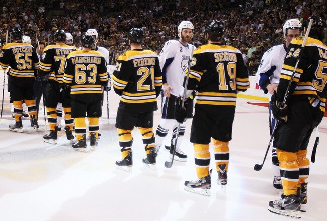 BOSTON, MA - MAY 27:  The Tampa Bay Lightning congratulate the Boston Bruins after the Bruins defeated the Lightning 1 to 0 in Game Seven of the Eastern Conference Finals during the 2011 NHL Stanley Cup Playoffs at TD Garden on May 27, 2011 in Boston, Massachusetts.  (Photo by Elsa/Getty Images)