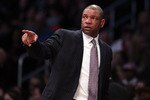 LOS ANGELES, CA - FEBRUARY 20:  Head coach Doc Rivers of the Eastern Conference points in the 2011 NBA All-Star Game at Staples Center on February 20, 2011 in Los Angeles, California. NOTE TO USER: User expressly acknowledges and agrees that, by downloading and or using this photograph, User is consenting to the terms and conditions of the Getty Images License Agreement.  (Photo by Jeff Gross/Getty Images)