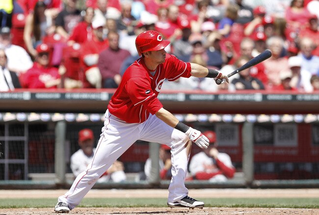 CINCINNATI, OH - APRIL 21: Paul Janish #7 of the Cincinnati Reds drives in a run in the seventh inning against the Arizona Diamondbacks at Great American Ball Park on April 21, 2011 in Cincinnati, Ohio. The Reds defeated the Diamondbacks 7-4. (Photo by Joe Robbins/Getty Images)