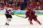 VANCOUVER, BC - FEBRUARY 24:  (R-L) Alexander Ovechkin #8 of Russia skates next to Sidney Crosby #87 of Canada in the third period during the ice hockey men's quarter final game between Russia and Canada on day 13 of the Vancouver 2010 Winter Olympics at Canada Hockey Place on February 24, 2010 in Vancouver, Canada.  (Photo by Bruce Bennett/Getty Images)
