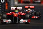 MONTE CARLO, MONACO - MAY 29:  Felipe Massa of Brazil and Ferrari leads from Lewis Hamilton of Great Britain and McLaren during the Monaco Formula One Grand Prix at the Monte Carlo Circuit on May 29, 2011 in Monte Carlo, Monaco.  (Photo by Vladimir Rys/Getty Images)