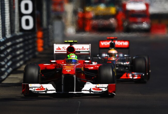 MONTE CARLO, MONACO - MAY 29:  Felipe Massa of Brazil and Ferrari leads from Lewis Hamilton of Great Britain and McLaren during the Monaco Formula One Grand Prix at the Monte Carlo Circuit on May 29, 2011 in Monte Carlo, Monaco.  (Photo by Vladimir Rys/Getty Images)