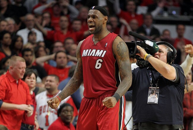 CHICAGO, IL - MAY 26:  LeBron James #6 of the Miami Heat celebrates after the Heat won 83-80 against the Chicago Bulls in Game Five of the Eastern Conference Finals during the 2011 NBA Playoffs on May 26, 2011 at the United Center in Chicago, Illinois. NOTE TO USER: User expressly acknowledges and agrees that, by downloading and or using this photograph, User is consenting to the terms and conditions of the Getty Images License Agreement.  (Photo by Mike Ehrmann/Getty Images)