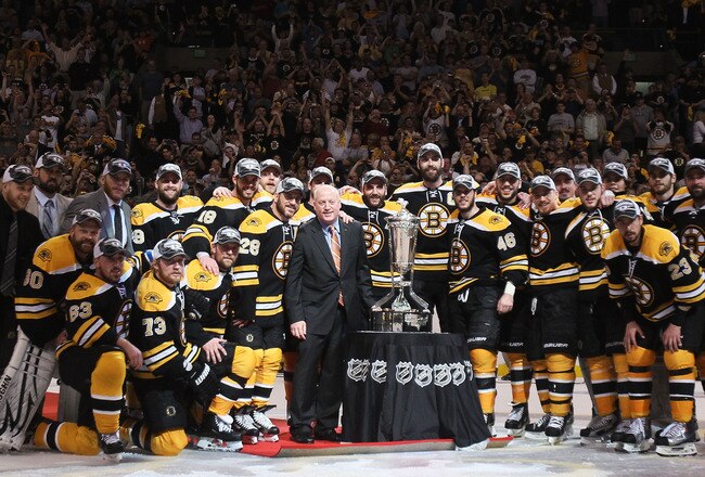 BOSTON, MA - MAY 27:  The Prince of Wales trophy is presented to the Boston Bruins by Deputy Commissioner Bill Daly after they defeated the Tampa Bay Lightning 1 to 0 in Game Seven of the Eastern Conference Finals during the 2011 NHL Stanley Cup Playoffs at TD Garden on May 27, 2011 in Boston, Massachusetts.  (Photo by Elsa/Getty Images)