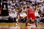MIAMI, FL - MAY 24:  LeBron James #6 of the Miami Heat defends Derrick Rose #1 of the Chicago Bulls in Game Four of the Eastern Conference Finals during the 2011 NBA Playoffs on May 24, 2011 at American Airlines Arena in Miami, Florida. The Heat won 101-93 in overtime. NOTE TO USER: User expressly acknowledges and agrees that, by downloading and or using this photograph, User is consenting to the terms and conditions of the Getty Images License Agreement.  (Photo by Mike Ehrmann/Getty Images)